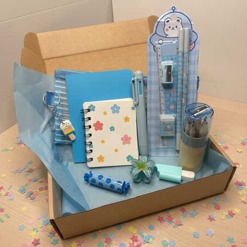 Blue mini bundle in box with confetti on table